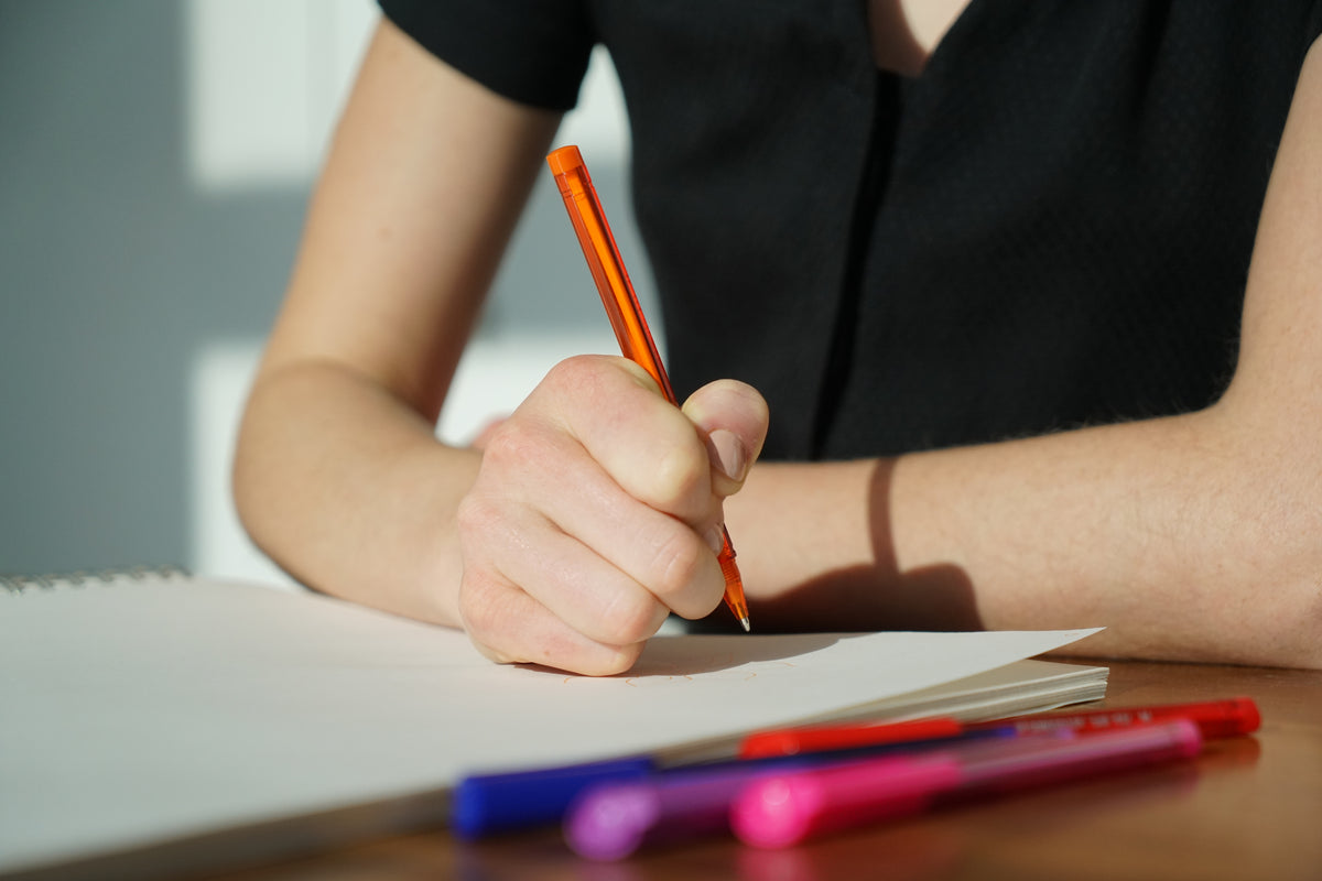 Girl writing review on AI smart glasses